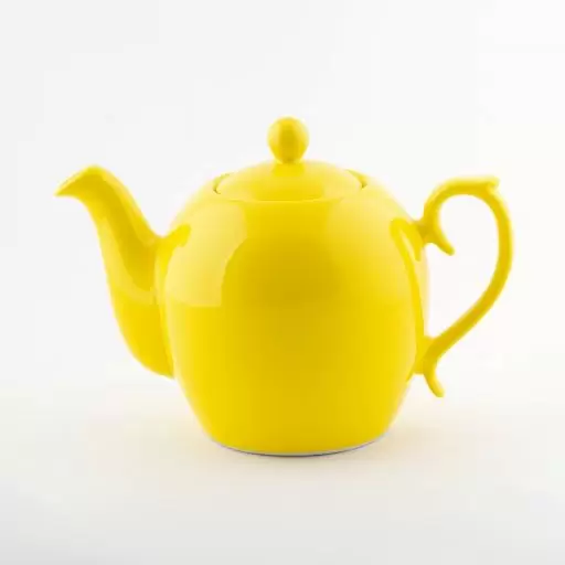 قوری رنگ زرد مدل ساده دسته دار